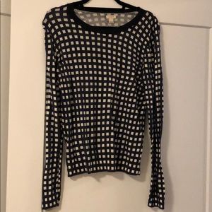 Navy blue and white checkered sweater